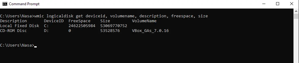 screenshot of the cmd command wmic logicaldisk get deviceid, volumename, description, freespace, size
